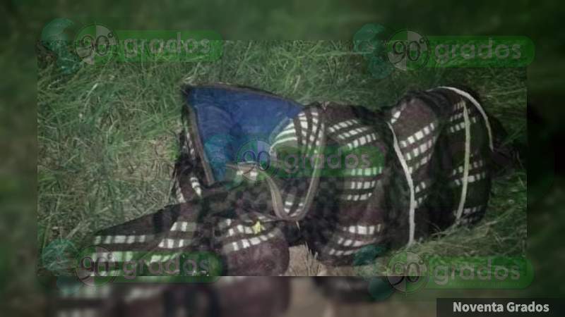 Hallan cadáver encobijado en Zamora, Michoacán 