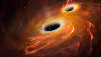 Astrónomos pronostican fusión de 2 hoyos negros en uno supermasivo