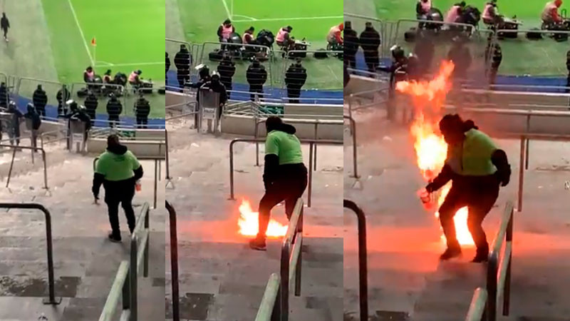 Exhiben a personal de seguridad, supuestamente encendiendo fuego en estadio de Monterrey 