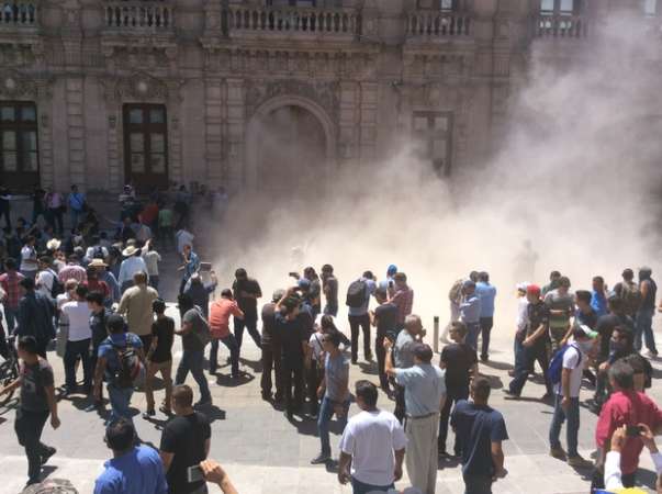 100 detenidos, 18 policías heridos; tres patrullas vandalizadas fue el saldo que dejó una manifestación en Chihuahua  