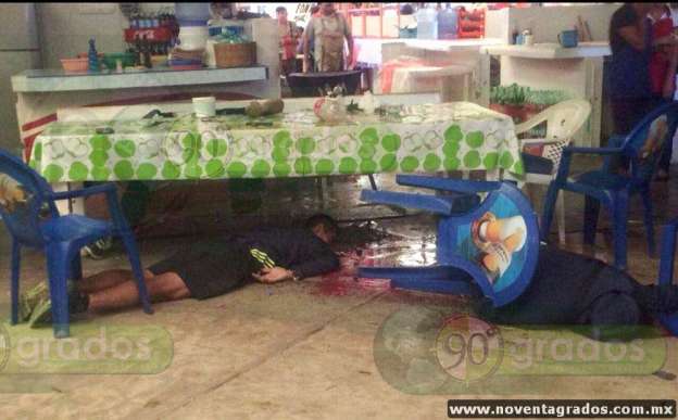 Ejecutan a tres policías federales en mercado de Chilapa, Guerrero - Foto 0 