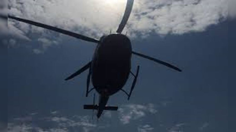 Persiguen con helicóptero dos camionetas del crimen organizado en Morelia, tras megabalacera  
