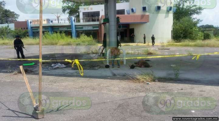 Michoacán: Abandonan a dos decapitados en gasolinera - Foto 0 