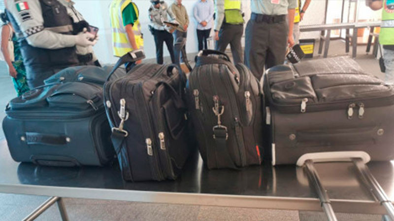 Guardia Nacional encuentra maletas con droga en vuelo de Puebla a Cancún 