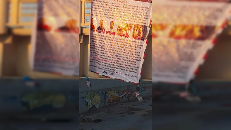 Tras videos que ligan a GN con masacre de bebés y mujeres en Guanajuato, aparecen lonas con nombres, números de patrullas y recompensa de 1 millón 