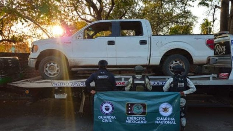 En Apatzingán, Michoacán, aseguran tres vehículos y más de mil cartuchos 