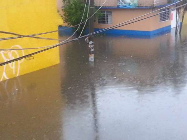 Lluvias causan inundaciones en domicilios de Morelia - Foto 0