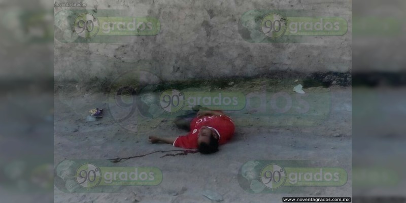 Abandonan cuerpo de joven ejecutado, en calles de Buenavista 