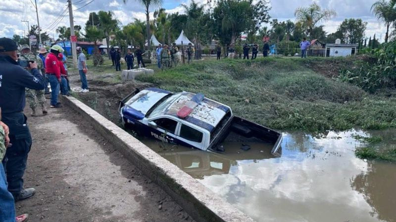 Localizan los cuerpos de tres mujeres dentro de patrulla arrastrada por el río Atoyac  