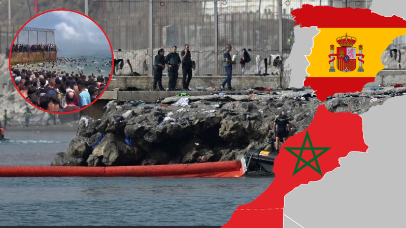 España instala barrera marítima tras masiva llegada de migrantes a Ceuta 