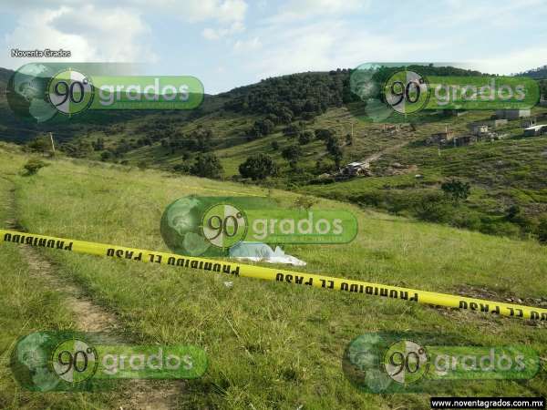 Localizan cadáver de mujer en predio de Morelia - Foto 1 
