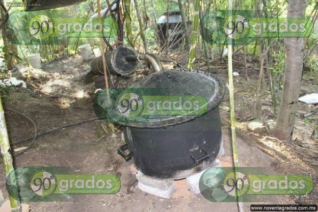 Aseguran narcolaboratorio y decomisan casi 100 kilogramos de “cristal” en Parácuaro, Michoacán - Foto 8 