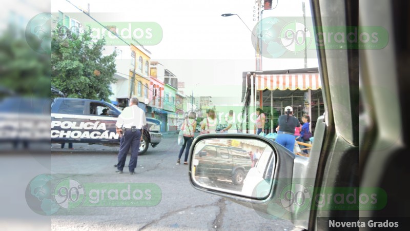 Muere policía al enfrentarse a tiros a delincuentes en Apatzingán, Michoacán - Foto 1 