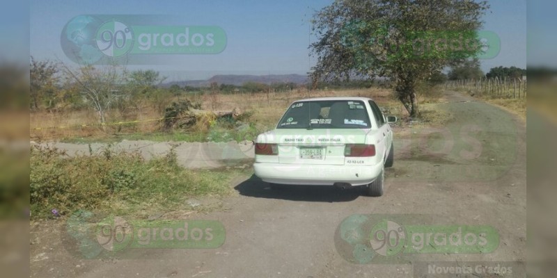 Localizan cadáver al interior de un taxi en Múgica, Michoacán - Foto 1 