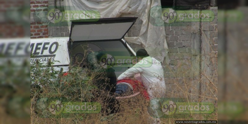 Asesinan a padre e hijo sobre camino de tierra en Zamora, Michoacán - Foto 0 