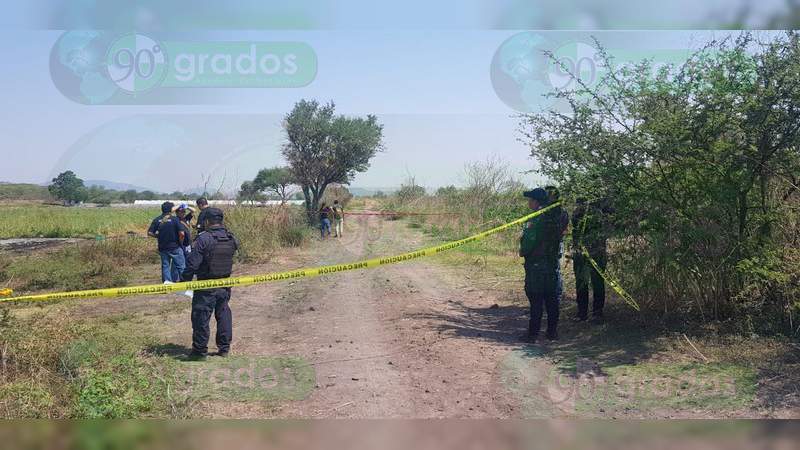 Localizan el cuerpo baleado de una mujer en Tangamandapio, Michoacán - Foto 0 