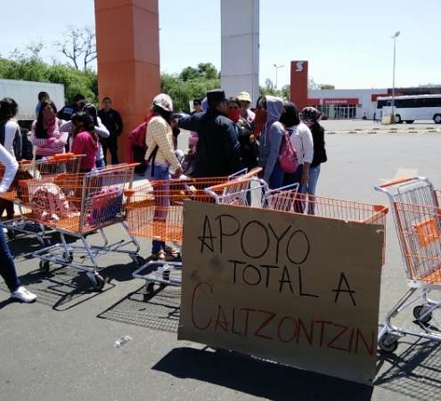 Normalistas bloquean centros comerciales en Morelia; exigen absolución - Foto 1 