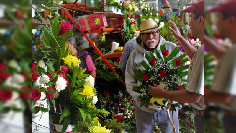 Por el Día de Muertos Los mercados están convertidos en florestas - Foto 0 