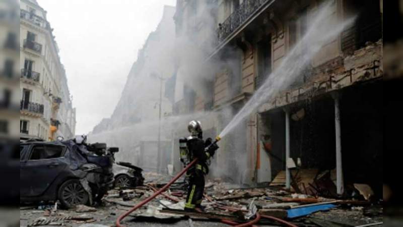 Mueren 10 personas por incendio en edificio de París - Foto 0 