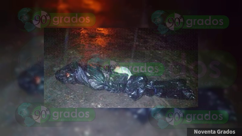 Abandonan un cuerpo embolsado en Apatzingán, Michoacán - Foto 1 
