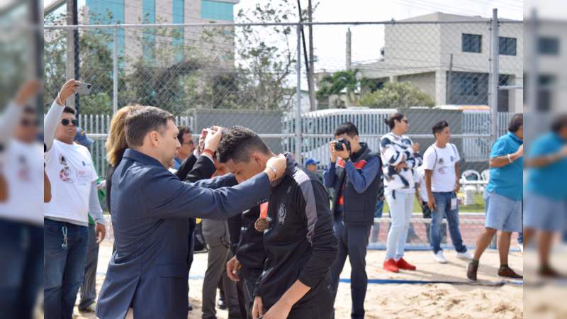 Bronce a Coalcomán en torneo  Nacional de voleibol de playa - Foto 1 